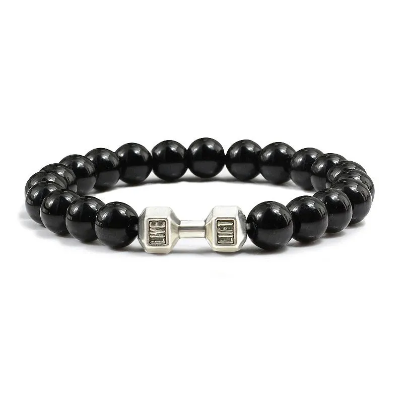 JC - Volcanic Stone Bracelet: Matte black lava and white beads with dumbbell charm for fitness lovers