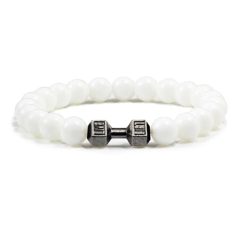 JC - Volcanic Stone Bracelet: Matte black lava and white beads with dumbbell charm for fitness lovers